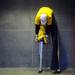 Neil Sauter, 29, of Blissfield, unfurls his maize and blue pants. Melanie Maxwell I AnnArbor.com